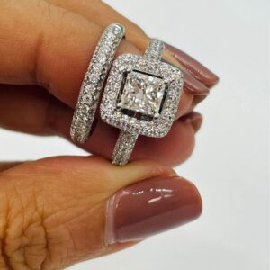 Platinum ring sets with 1.02 centre princess cut Mondavhie Man-made Diamond in D color , VVS1 , Excellent-cut & 1.03 accented diamonds  Matching band sets with 0.62 CTW of natural diamonds.
